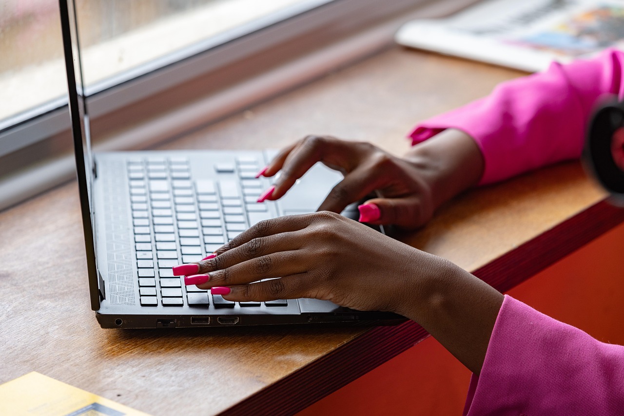 Laptop, typing, working — Discover the Wonders of Contemporary Art at Conde Duque Museum